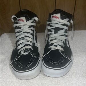 Vans Black and White High-Top Skate Sneakers